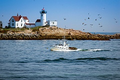 Eastern Point Lighthouse Guides Lobster Boat